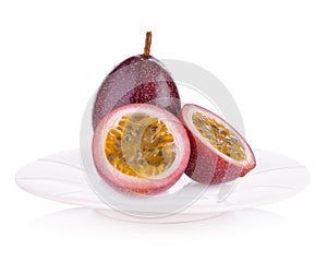 Passion fruit on plate  isolated on white background