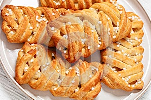 passion fruit puff pastry turnovers on a plate