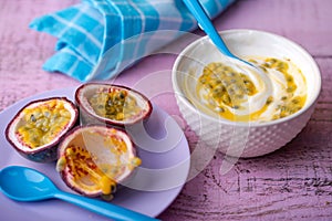 Passion fruit and yogurt on the rustic table