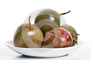 Passion fruits on dish