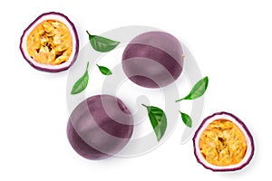 Passion fruits and a half with leaves isolated on white background. Isolated maracuya. Top view. Flat lay