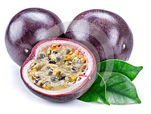 Passion fruits and its cross section with pulpy juice filled with seeds. White background photo