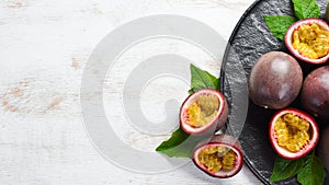 Passion fruits in a plate. Tropical Fruits.