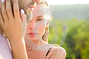 Passionate affectionate man and woman enjoying exciting moment of first kiss.