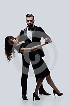 Passionate attractive casual couple dancing.
