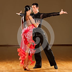 Passionate dancers dancing rumba photo