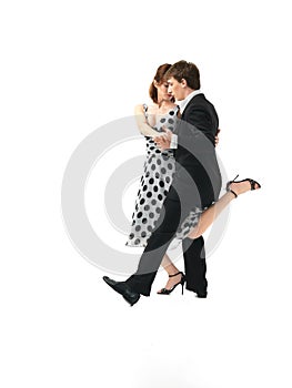 Passionate dancing couple on white background