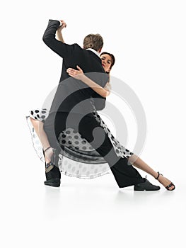 Passionate dancing couple on white background