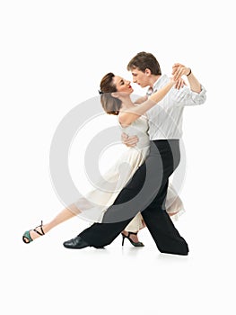 Passionate dancing couple on white background