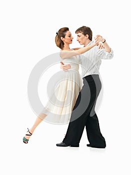 Passionate dancing couple on white background