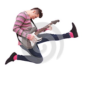 Passionate guitarist jumps in the air