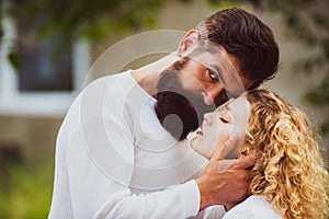 Passionate love. Couple in retro old style. Beautiful young couple waiting to kiss. Passionate man gently kissing