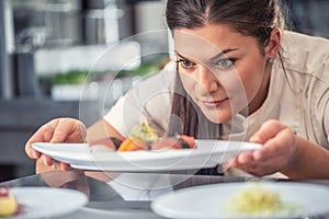 Passionate pro female chef presents her sushi delicacy