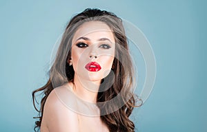 Passionate red lips, smokey eyes makeup. Sensual woman with fashion make-up.