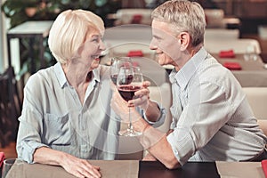 Passionate retired man looking at the woman