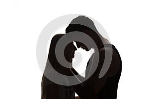 Passionate sensual attractive young couple in love, man caresses woman neck, isolated black and white portrait