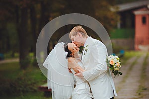 Passionate wedding kiss