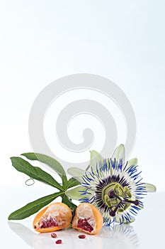 Passionflower and lcut fruit isolated on white background
