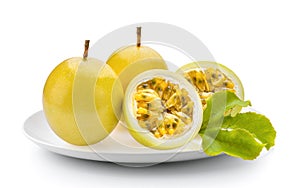 Passionfruit in plate isolated on a white background