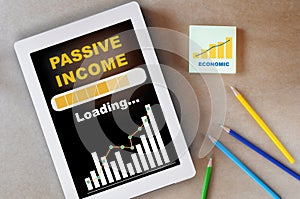 Passive income growth and online business using digital tablet or smartphone