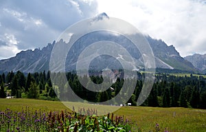 From Passo delle Erbe view of Sass de Putia with clouds