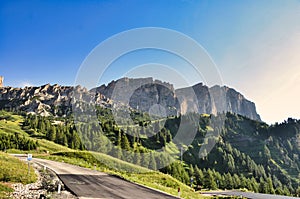 passo gardena in the dolomites. auto pass road, Sellaronda, Sellarunda, Langkofel. Morning mood in the mountains. Sun photo