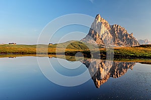 Passo Giau and Cima ra Gusela in lake reflection, Dolomites - It