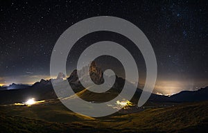 Passo Giau and Mount Nuvolau and Averau under a sky full of stars in Cortina D`ampezzo, famous ski resort in the Dolomites