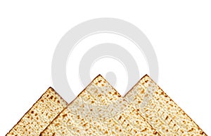 passover background with matzoh isolated on white as piramids.