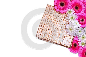 Passover background. matzoh (jewish passover bread) and flowers isolated on white