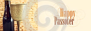 Passover background. Old Wine cup and matzoh (jewish holiday bread