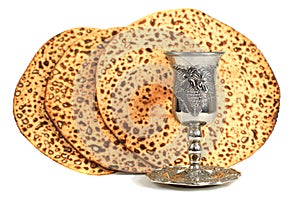 Passover concept: Round matzo and wine cup isolated