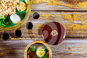 Passover jewish food. Pesach matzo balls soup and matzoh bread, wine, seder plate