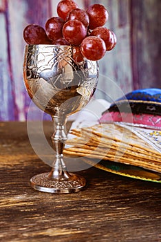 Passover matzoh jewish holiday bread over wooden table