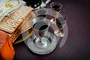 Passover wine cup symbols of unleavened matzah bread during a Pesach holiday