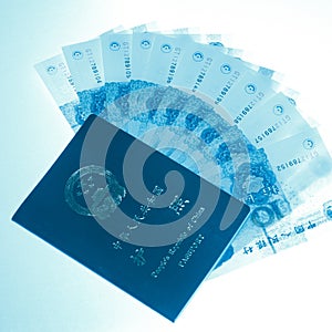 Passport and bank note