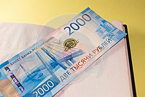 Passport and blue Russian  banknote