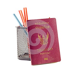 Passport book and pencil