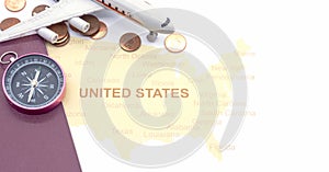 Passport compass and coins on a American map. business travel concept