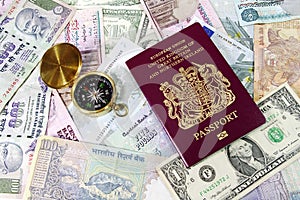 Passport and Compass on Currency Bills