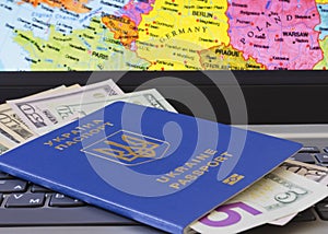 Passport with dollar bills on the background of the map of Europe 222