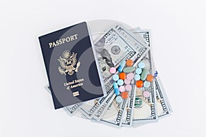 Passport, dollars and pills