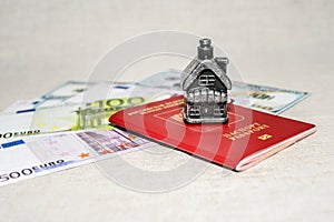 Passport, money and home - the concept of buying a property