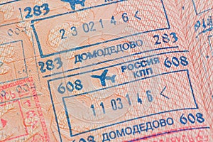 Passport page with the immigration control stamps of the Domodedovo airport in Moscow, Russia.