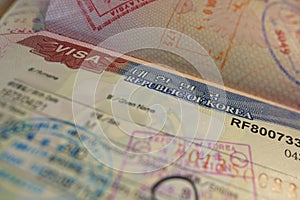 Passport page with Korean visa and immigration control stamps.