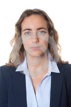 Passport photo of a cool blond businesswoman with blue eyes and blazer