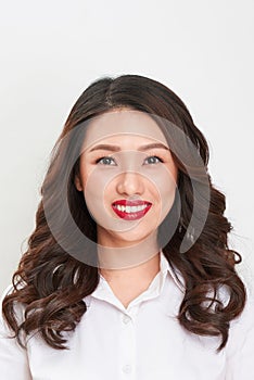 Passport photo. Portrait of asian smiling woman.