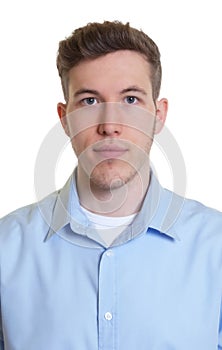 Passport picture of a cool guy in a blue shirt