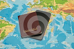 Passport and smartphone, world map. Travel concept