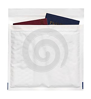 Passport spread in a white paper envelope, Travel concept.